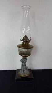 lot 67 image: Antique Kerosene Figural Composite Lamp