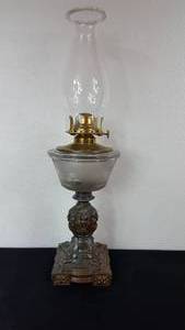 lot 84 image: Antique Kerosene Figural Composite Lamp