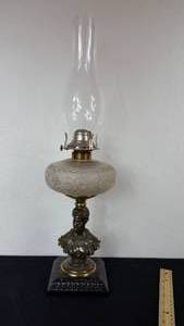 lot 87 image: Antique Kerosene Figural Composite Lamp