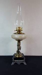 lot 6 image: Antique Kerosene Figural Composite Lamp