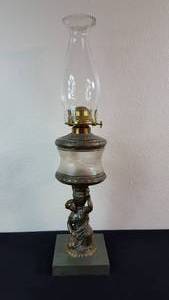 lot 7 image: Antique Kerosene Figural Composite Lamp