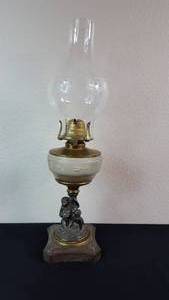 lot 10 image: Antique Kerosene Figural Composite Lamp