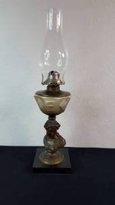 lot 17 image: Antique Kerosene Figural Composite Lamp