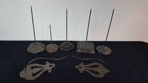 lot 205 image: Vintage Cast Iron Decorative Rat Tail and Spike Receipt Holders