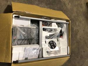 lot 25 image: RIDGID 9 Amp Corded 7 in. Wet Tile Saw with Stand Customer Returns See Terms on Auction