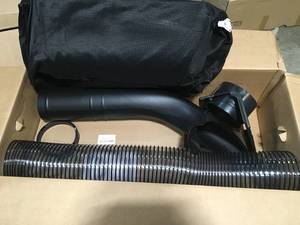 lot 28 image: Cub Cadet 42 in. and 46 in. Leaf Collection System Compatible with XT1 and XT2 Enduro Series Lawn Tractors (Cart Sold Separately) Customer Returns See Terms on Auction