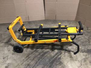 lot 4 image: TOUGHBUILT Universal QuickSetMiter Saw Stand with Class-Leading 10ft material extensions and portable gravity design Customer Returns See Terms on  Auction