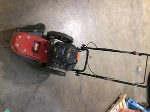 lot 35 image: Toro 22 in. 163cc Walk Behind String Mower, Cutting Swath with 4-Cycle Briggs and Stratton Engine For Parts Customer Returns See Terms on Auction
