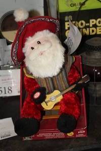 lot 589 image: Animated Singing Feliz Navidad Santa