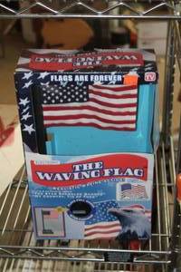 lot 754 image: Waving Flag Music Box (New in Box)