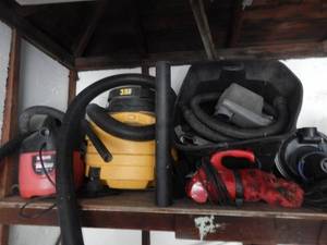 2-Shop Vacs, A Dirt Devil, & Assorted Accessories