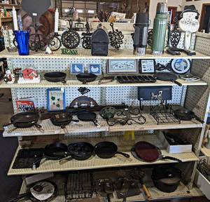 Contents of (5) Shelves - Cast Iron Pans, Cornbread pan, Thermoses, Lunch Boxes, BB Gun and More- Shelves are 60 Long Each