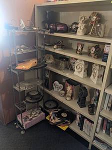 Contents of (5) Shelves  Narrow Metal Shelf and Contents - Antique Shoe Stretchers, Clocks, Records and More