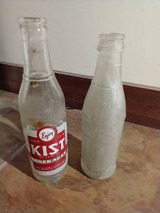 lot 32 image: (2) Vintage Pop Bottles