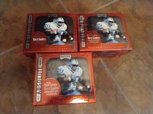 lot 63 image: (3) Boxes 1999 Playoff Absolute Football Cards