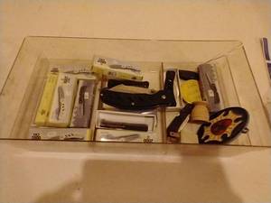 lot 80 image: Tote of Mini Knives