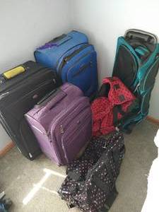 lot 129 image: (6) Rolling Suitcases