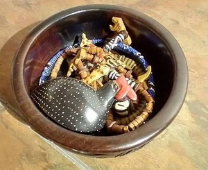 lot 185 image: Bowl of African Items  Coins