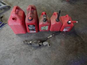 5-Assorted Gas Cans And A Come-Along