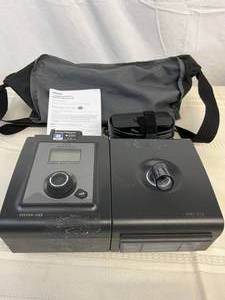 lot 24 image: MSRP $2500 Philips Respironics System One REMstar Auto With A-Flex & Sleep Mapper CPAP - VPAP Machine With Carrying Bag, Smart Card, Reservoir, Power Cord & Manual - Great Working Condition Has Sticker Residue
