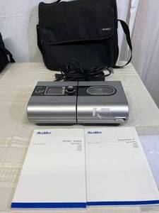lot 25 image: MSRP $2400 ResMed S9 Autoset EPR&nbspCPAP -&nbspVPAP Bi-Level with H5i Humidifier includes Data Card, Travel Bag, Power Cord, Reservoir,&nbspS8 Elite System and HumidAire 3i Manuals - Great Working Condition Has Stick Residue.