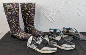 lot 59 image: (3) Pair of Womens Shoes Lipstick Print Rainboots Sz. 6, Multicolored Chaco Sandals Sz. 4, Silver Steve Madden Sneakers Sz. 7