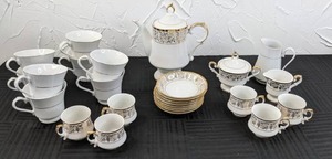 lot 70 image: SHI Fine China Golden Reflection Tea Set Tea Pot, Cups, Saucers, Sugar and Creamer