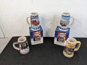 lot 36 image: Ducks Unlimited Miller Mug, (2) 1995 Budweiser Holiday Mugs, 1989 Budweiser Holiday Mug