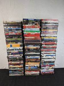 lot 28 image: Collection of Over 100 DVDs Many Classic Titles Schindlers List, Mean Girls, What About Bob, Jerry Maguire, and So Many More
