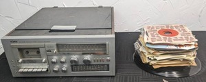 lot 78 image: Vintage YORX M2455 AMFM Receiver, Cassette, Record Player and Stack of 45rpm and 33rpm Vinyl Records