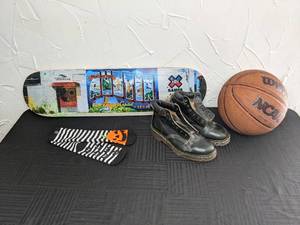 lot 89 image: X Games Austin 2015 Skateboard Deck, Wilson NCAA Basketball, Dr. Martens Black Boots Size 6, Halloween Socks