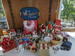 lot 103 image: Assortment of Christmas Decorations Ornaments, Holiday Sculptures Night Light, Sleigh, Music Box, Figurines, Santa Mugs and More