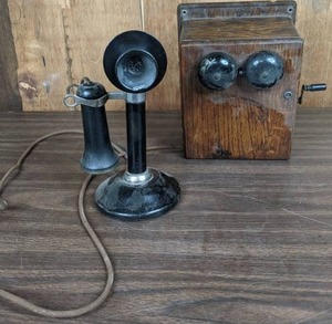 lot 232 image: Antique Stromberg Carlson Tel. Mfg. Co. Metal Candlestick Phone w Receiver & Antique Hand Cranked Wooden Case Wall Phone.