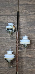 lot 238 image: Vintage Tension 3-Light Pole Lamp with Floral Accented Glass Shades, Wood and Brass Pole