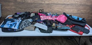 lot 280 image: An Assortment of Varying Sized Bags, Fanny Packs, Purses, etc