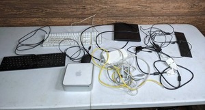 lot 269 image: Apple Mac Mini Desktop, Apple Keyboard, HP Keyboard, Wireless Computer Mouse, HP Computer Mouse, Indoor Antenna