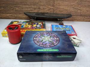 lot 147 image: An Assortment of Family Fun Password, Who Wants to be a Millionaire, Clue, Card Decks, and More