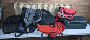 lot 205 image: Collection of Soft Sided Bags, Backpacks, Luggage (Samsonite, Embark, Wolf Creek) and a Hanging Cloth Shoe Rack