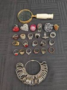 lot 381 image: Collection of Costume Jewelry Rings with Metal Ring Sizer and Magnifying Glass
