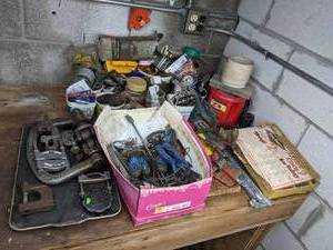 lot 143 image: Contents of Table Clamps, Steel Wool, Drill Bits, Wrenches, NutsBoltsScrews, Pins, BrakFix Brake Relining Tool, and More