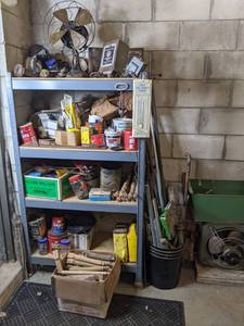 lot 389 image: Metal Garage Shelving unit Plus Contents (Vintage Fans, Wooden Table Legs, ElectronicAutomotive Parts, and More)