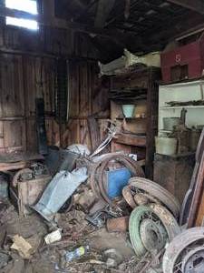 lot 74 image: Room Full of Vintage Vehicle Parts and More
