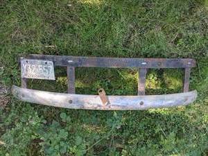 lot 45 image: Vintage Car Bumper with Minnesota License Plate Attached