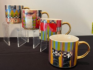lot 51 image: Mackenzie Childs Nutcracker Mug Tower