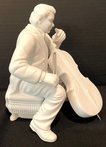 lot 162 image: Department 56 Winter Silhouette Collection White Porcelain Christmas Concerto Cellist Figurine