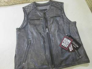 lot 1 image: (BS) Xelement Leather Gun Pocket Ve...