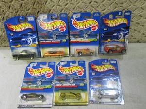 lot 203 image: (EC1) Assorted Hot Wheels in Packag...