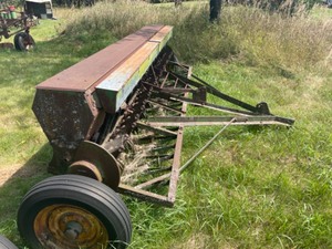 12 Grain Drill with grass seeder JD