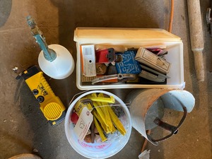 Flashlight, Spray Bottle, Tent Sticks, Tupperware with cover