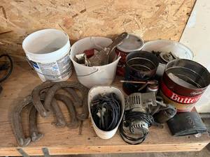 lot 59 image: Horseshoes & Everything Pictured on Counter